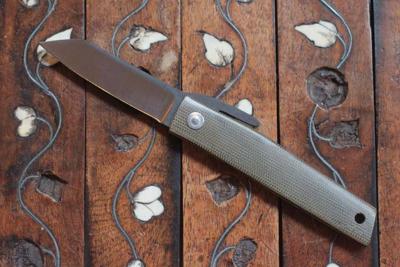 Higo M.M - Green micarta